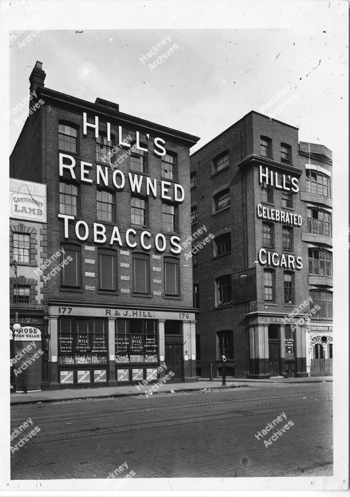 Hill, R and J Ltd, tobacco and cigar factory, 175-177 Shoreditch, corner of New Inn Street (now Yard). Includes large signage on front of building Hill’s Renowned Tobaccos, Hill’s Celebrated Cigars, c.1930.