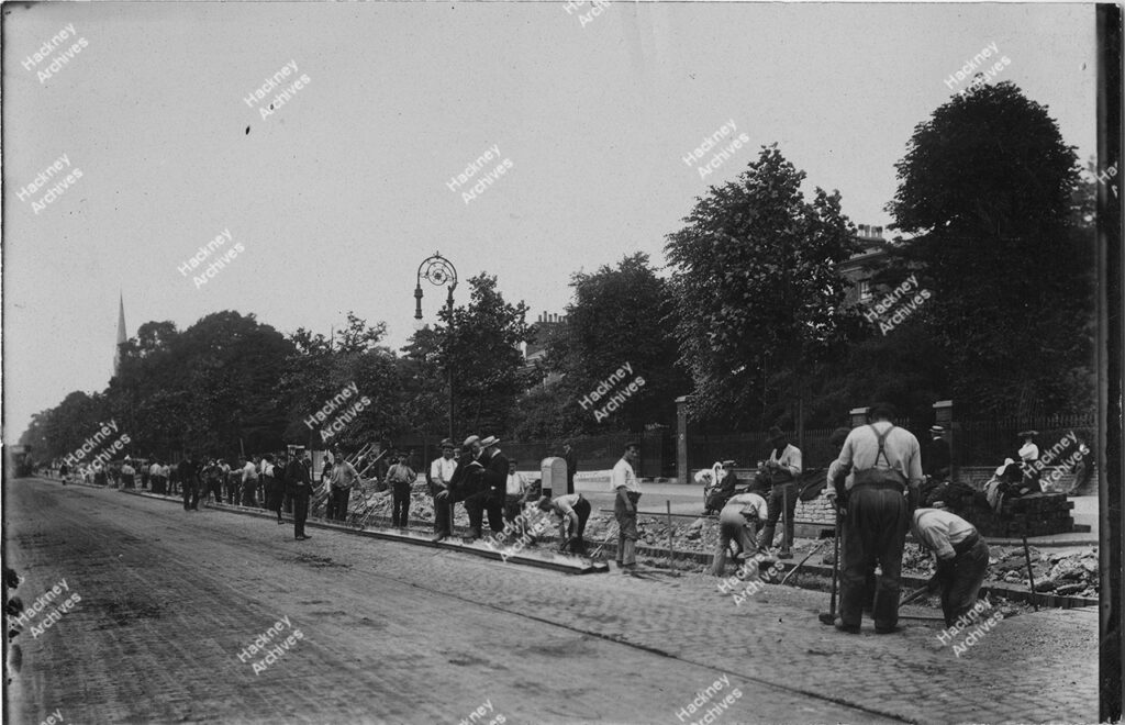 Stamford Hill east side looking north, close to Lynmouth Street. From Grove Lane to Stamford Hill congregational church. Includes workmen laying the lines for electric trams, c.1910.