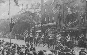 Cavalry procession for the opening of Hackney Central Library by The Prince of Wales (King Edward VII) and Princess of Wales (Princess Mary), Mare Street, Hackney. Includes The Hackney Empire and celebration decorations on all buildings, 1908.