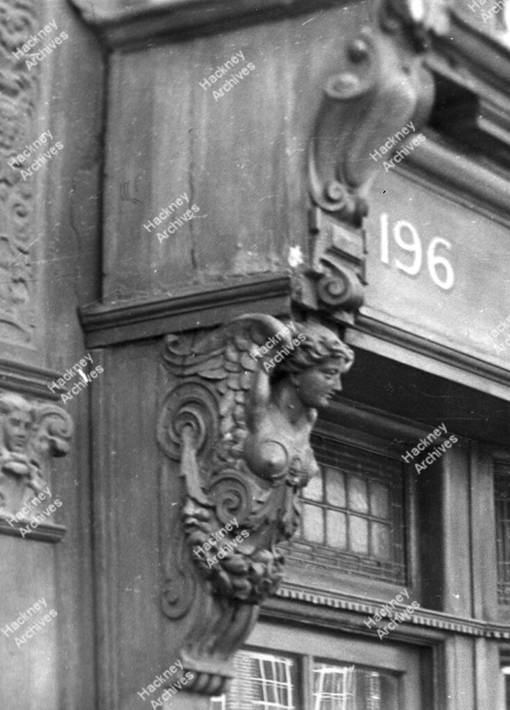 Harry Conway reproduction furniture maker, west side, 196 Shoreditch High Street. Detail of shop sign, c.1960.