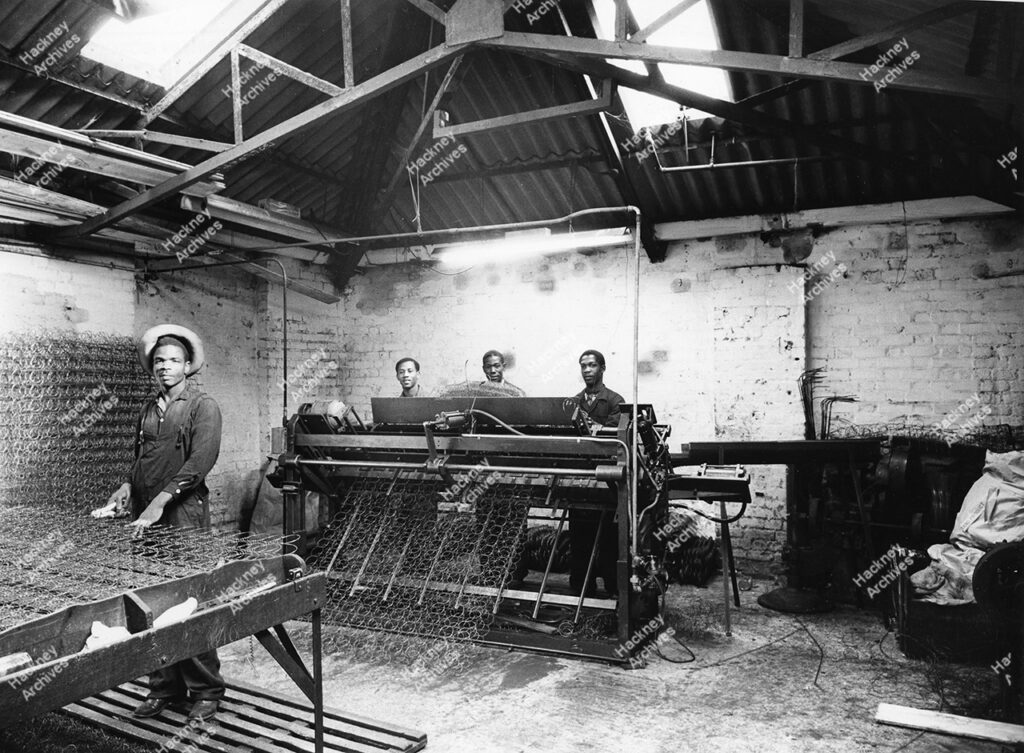 Interior of the spring making workshops of Poplar Bedding Co. LTD, 171-185 Hackney Road / Fellows Street. Includes men at work. 1960.