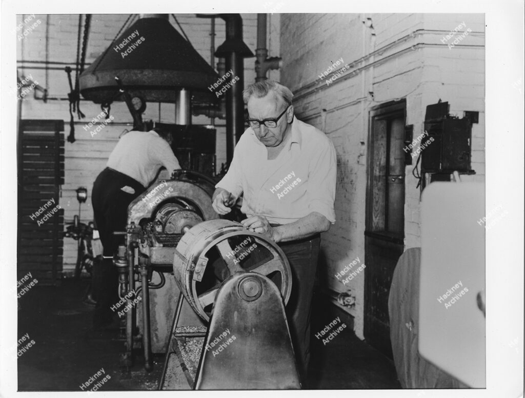 Worker laying out type in the print room of Hackney Gazette newspaper, c.1975.