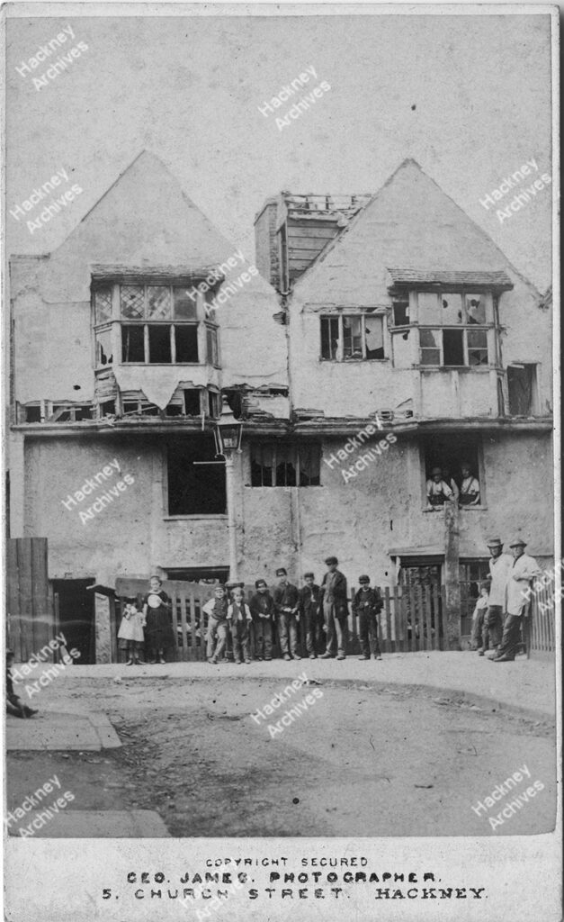 A timber framed Tudor era house prior to demolition, north east of Baxter’s Court, Mare Street, c.1870.