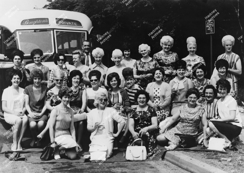 A & M Rosenberg’s, Mantle Manufacturers, Hackney. Includes a large group of women in front of a Broughton’s bus for an outing to southend, c.1962.