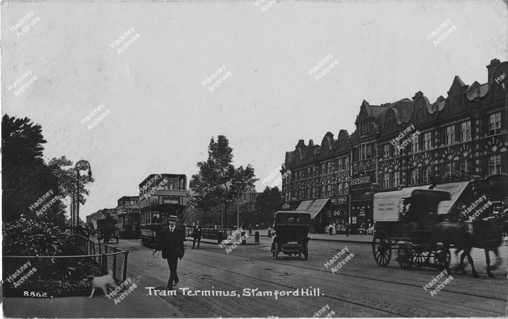 Postcard of the Tram terminus at The Broadway, Stamford Hill east side. Includes electric trams and J. Sainsbury building, c.1912, The Broadway, Stamford Hill, Hackney, c.1912.