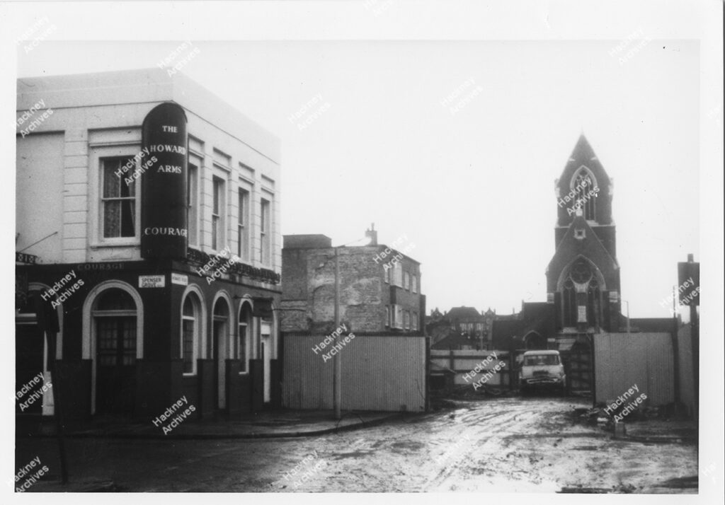 The Howard Arms, Spenser Grove  on junction with Howard Road. Includes St Matthias Church behind development area, Hackney, c.1974.