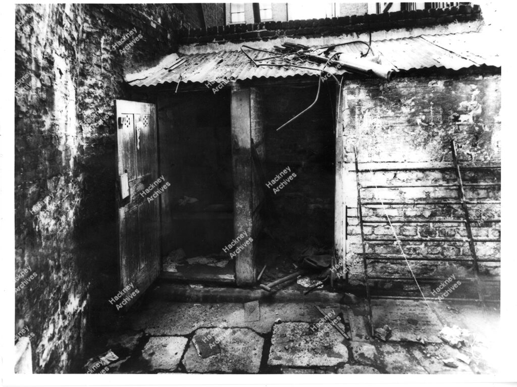 Example of slum yard / back garden with shed, Shoreditch, Hackney, c.1950.