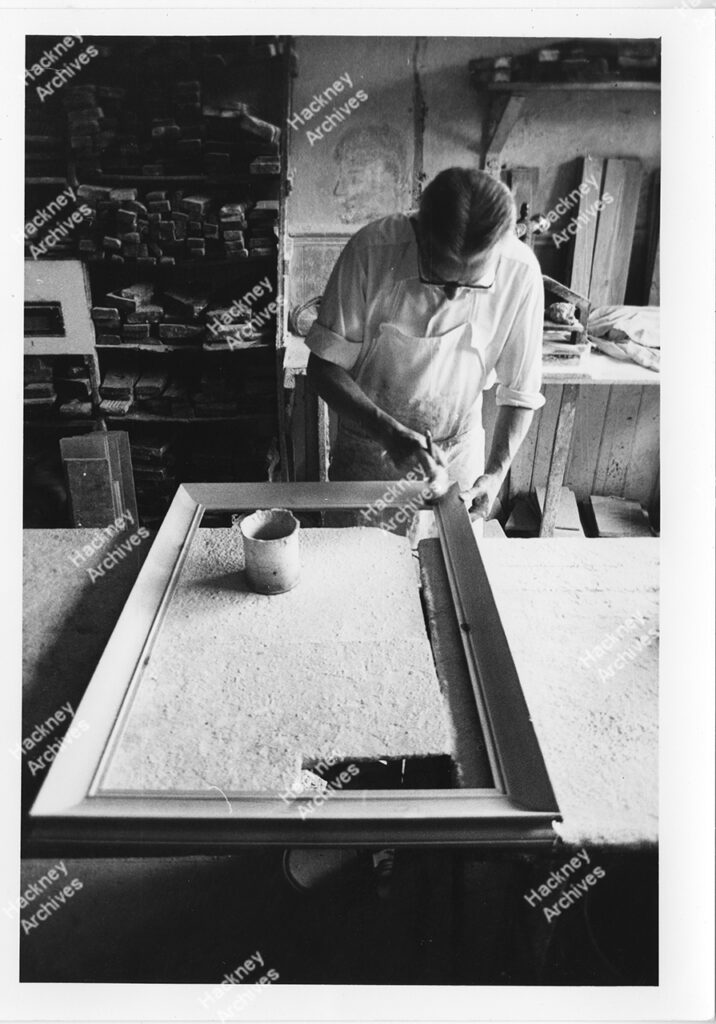 Henry Buck, Frame maker in his studio in Nevil Road, Stoke Newington, Hackney, 1977.