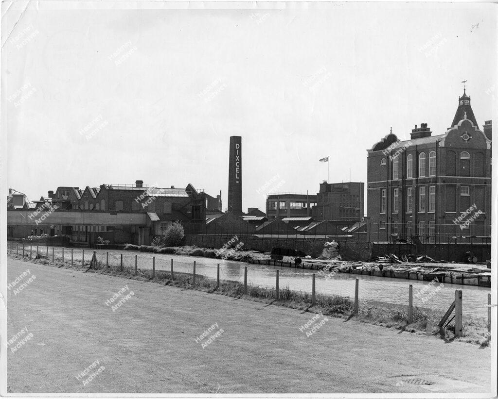 Atlas Works, Dixcel Tower / chimney, Gainsborough Primary School, Silk Mills Square, Hackney. View from east side of River Lea Navigation, 1966.