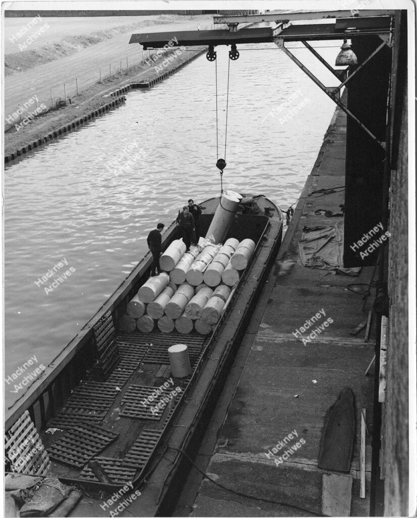 Barge on River Lea unloading to Atlas Works, Berkshire Road Hackney, 1966.