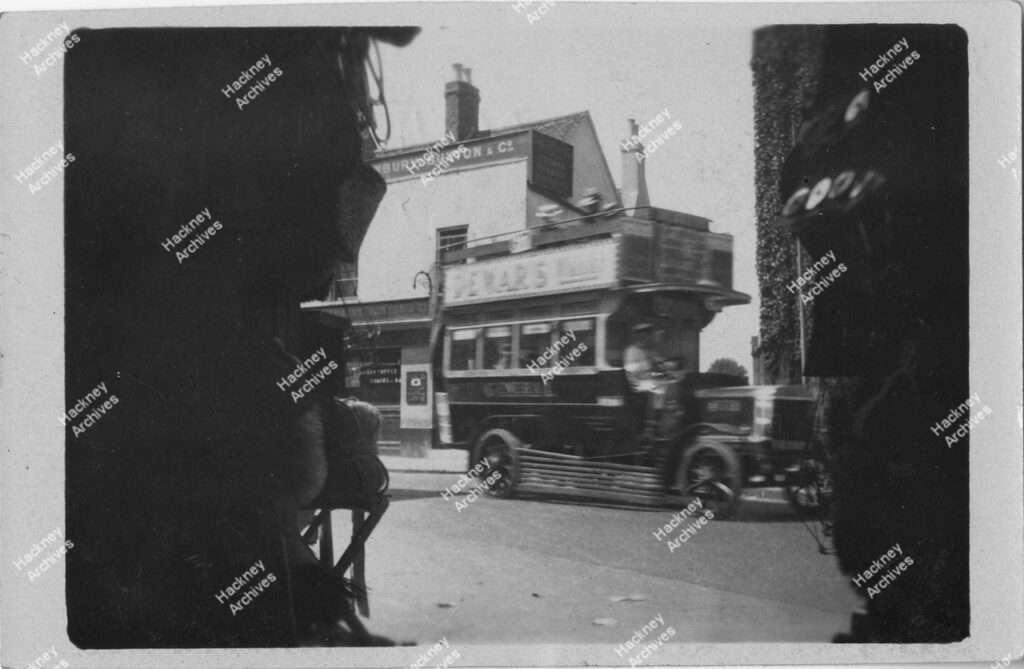 Stoke Newington Church Street, Hackney, 1922. A motor bus in motion on Church Street Stoke Newington. Includes Red Lion pub.