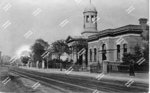 west Hackney Church and the Tyssen Manorial and Estate Offices, east side of Stoke Newington Road, c.1872. The Estate Offices were built after 1868 and demolished in 1880-81 to build three shops.