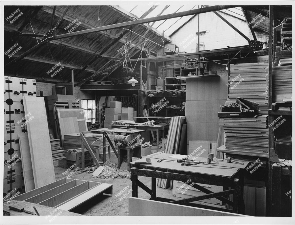 Interior of Kewley LTD toll cutting and saw workshop, Weymouth Terrace (situated behind 185-187 Hackney Road), 1960.