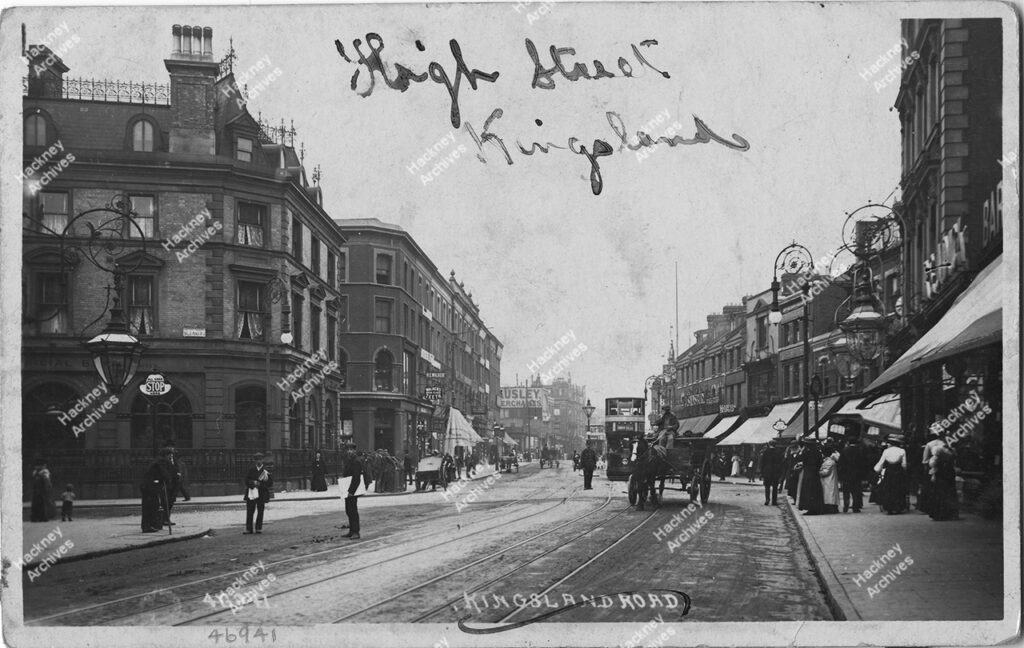 Kingsland Road High Street at Dalston Junction looking north, with tram and horse drawn cart., Hackney, c.1915.