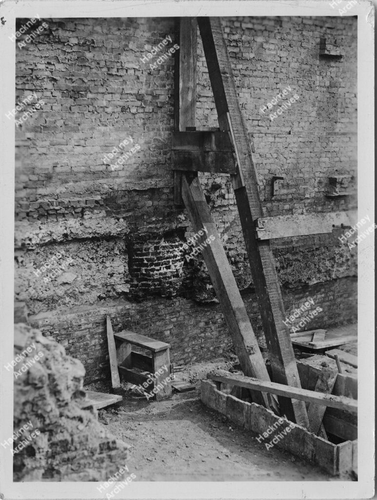 Manor House foundations revealed, Church Row, Stoke Newington, Hackney. 1936. The revealing of the foundations of Manor House, Stoke Newington after the demolition of Church Row, prior to the construction of the new town hall.
