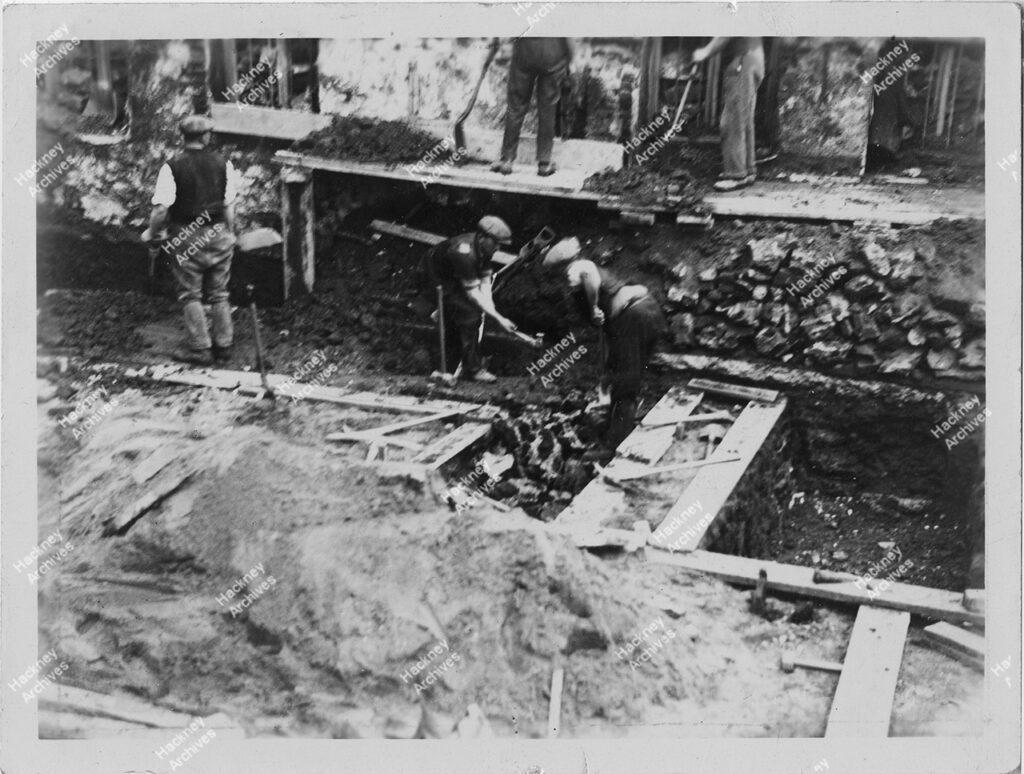 Manor House foundations revealed, Church Row, Stoke Newington, Hackney. 1936. The revealing of the foundations of Manor House, Stoke Newington after the demolition of Church Row, prior to the construction of the new town hall.