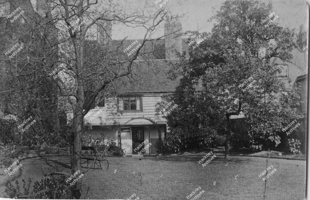 Back view of a weather boarded house and garden, Upper Clapton, Hackney, c.1869.