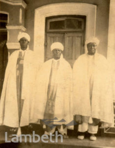 PORTRAITURE: THREE MEN IN TRADITIONAL ATTIRE