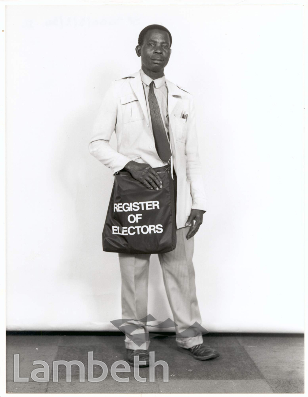 PORTRAITURE: MAN WITH ELECTORAL REGISTRATION BAG
