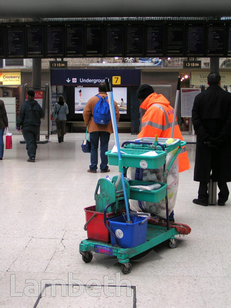 CLEANER WITH TROLLEY, WATERLOO STATION