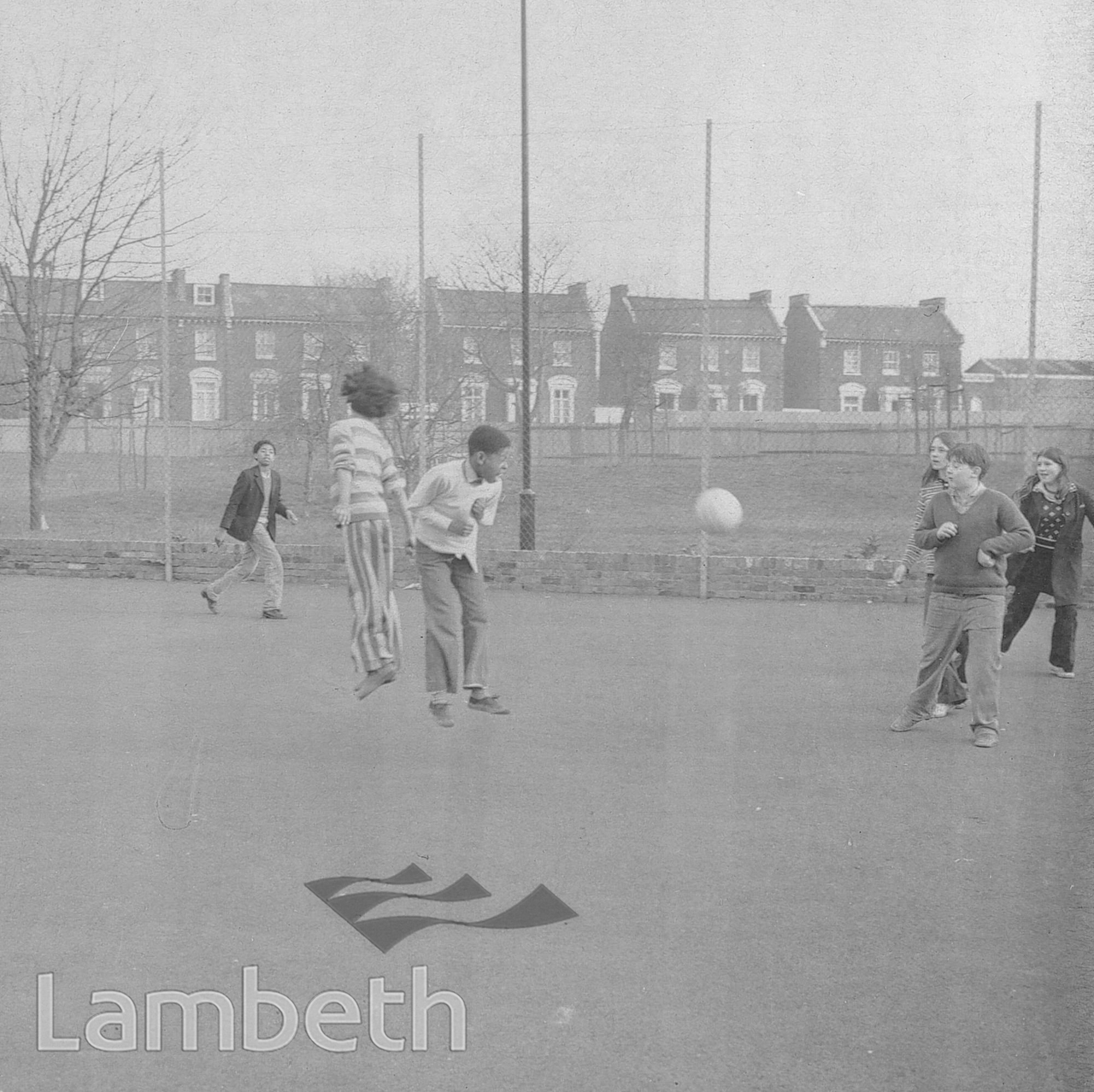 CHILDREN PLAYING FOOTBALL, BRIXTON NORTH