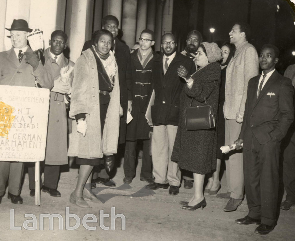 CLAUDIA JONES AND FRIENDS OUTSIDE THE EX-SERVICEMENS CLUB