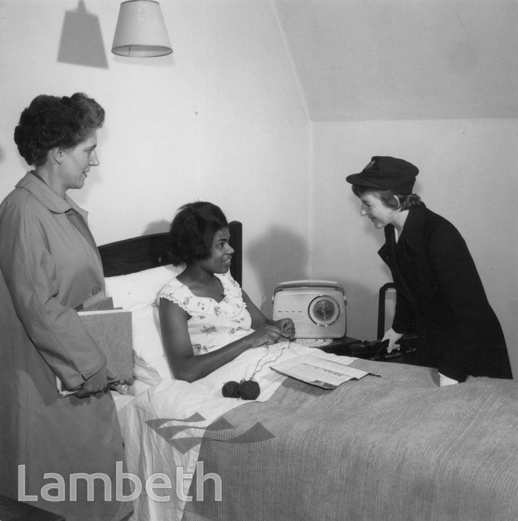 DISTRICT NURSE WITH PATIENT