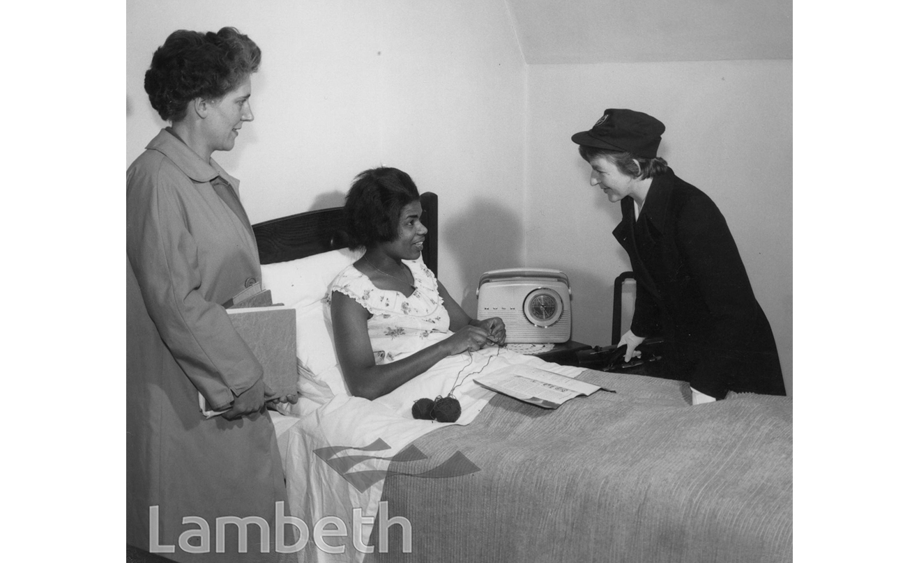 DISTRICT NURSE WITH PATIENT