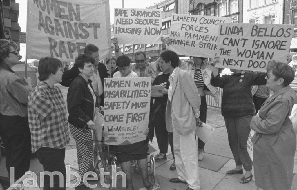 LINDA BELLOS WITH PROTESTERS, TOWN HALL, BRIXTON