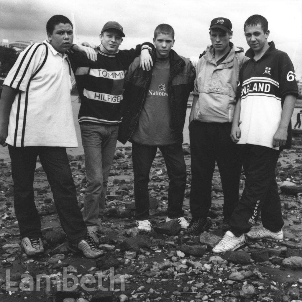 TEENAGERS ON THAMES FORESHORE, WATERLOO