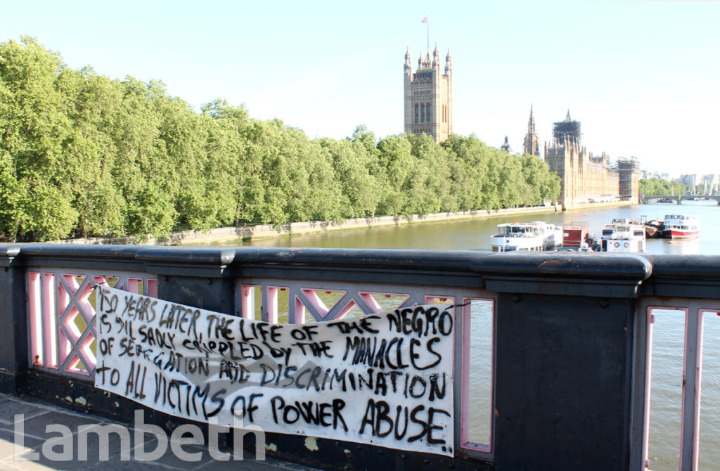 BLACK PROTEST BANNER, LAMBETH BRIDGE