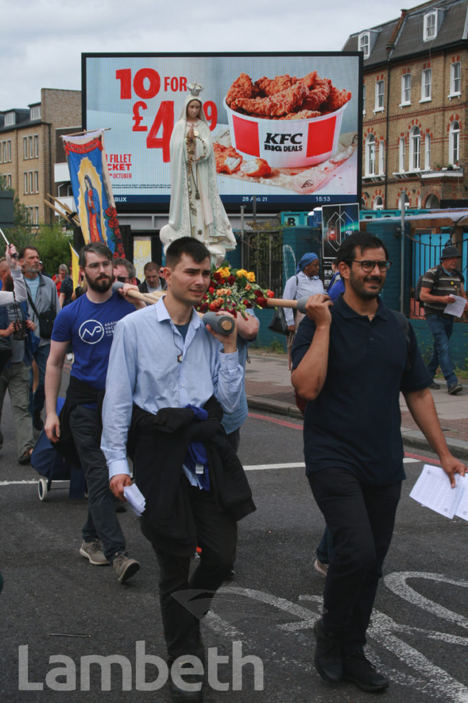 SAINT MARY STATUE, ANTI-VACCINE PROTEST MARCH, BRIXTON ROAD