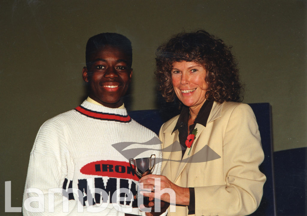 KATE HOEY M.P. PRESENTING AWARD, ALFORD HOUSE CLUB, AVELINE STREET, KENNINGTON