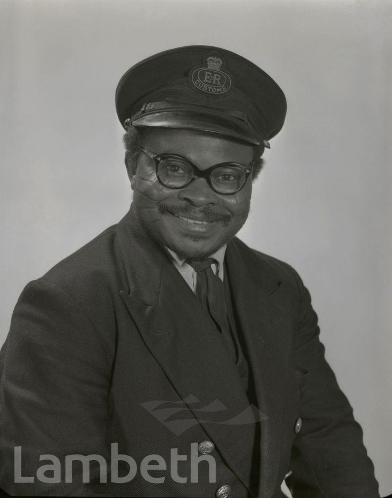 STUDIO PORTRAIT BY JIM MANNING OF CUSTOMS OFFICIAL