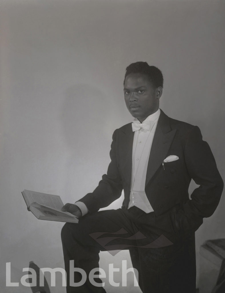 STUDIO PORTRAIT OF YOUNG MAN BY JIM MANNING