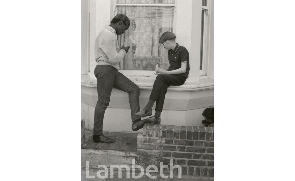 YOUNG MEN PLAYING CARDS