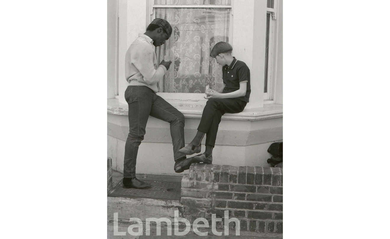 YOUNG MEN PLAYING CARDS