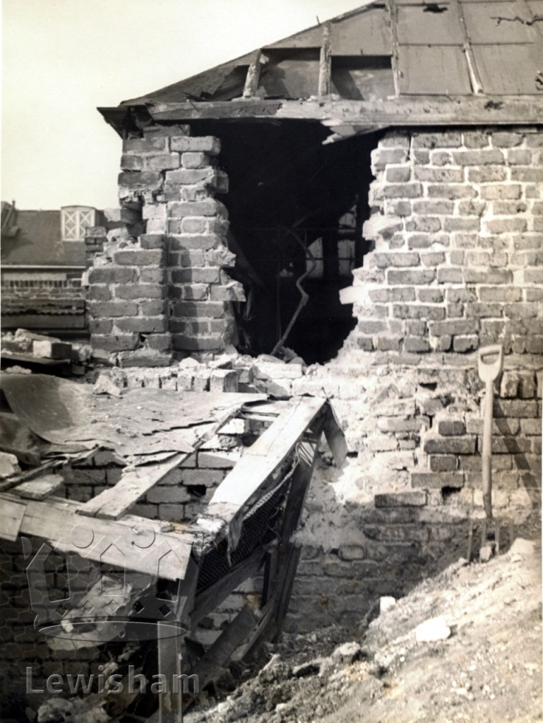 Harefield Road, no 13 Unexploded bomb through side of wall