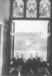 Bec School, Beechcroft Road, Tooting  Pupils looking at stained glass window- 1955