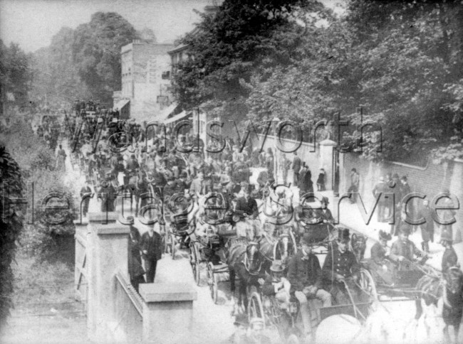 Totterdown Street, carriages returning from Epsom on Derby Day-  C1895