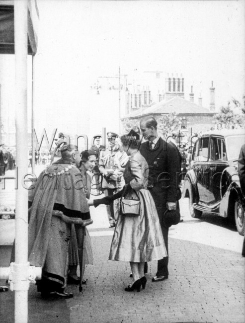 Mayoress of Wandsworth shaking hands with the Queen- 1953
