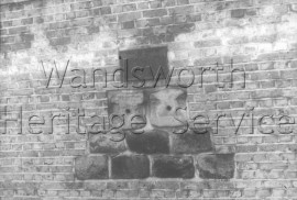 Sleepers from Surrey Iron Railway incorporated in the wall of the Ram Brewery, York Road-